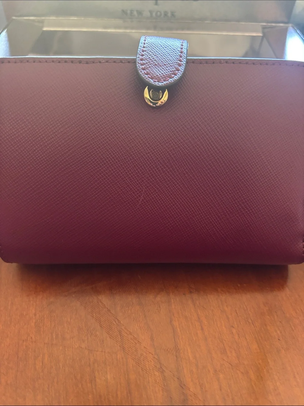 kate spade burgundy and gold zip-around wallet